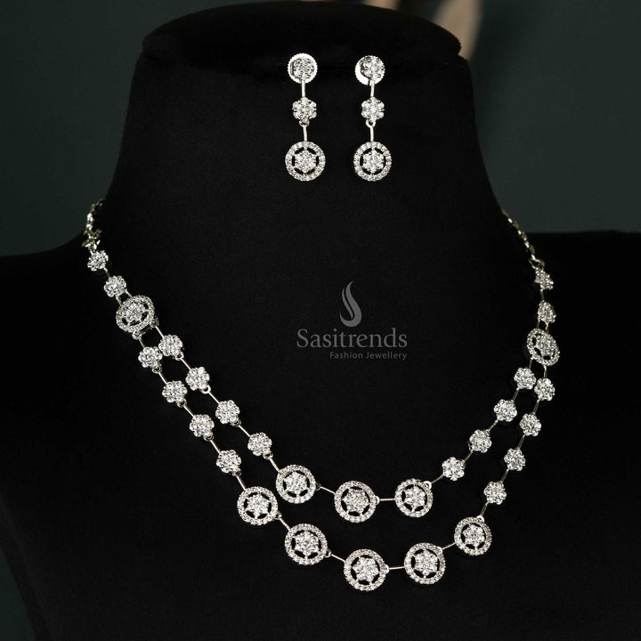 Sleek rhodium-plated necklace set with two layers of circular motifs and white American diamonds, complemented by matching earrings - Sasitrends