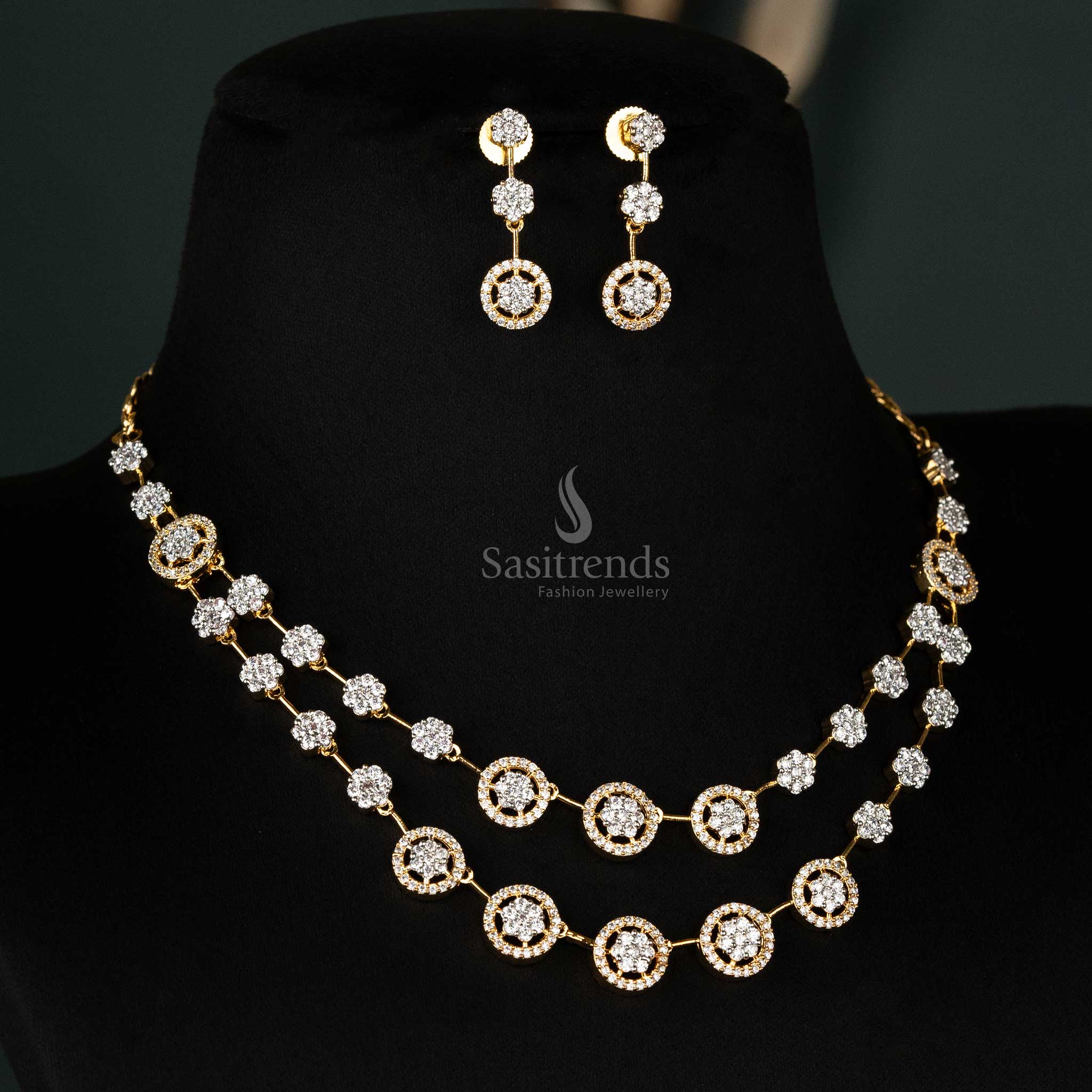 Regal gold-plated necklace set featuring a two-layered circular motif design adorned with white American diamonds and matching earrings - Sasitrends