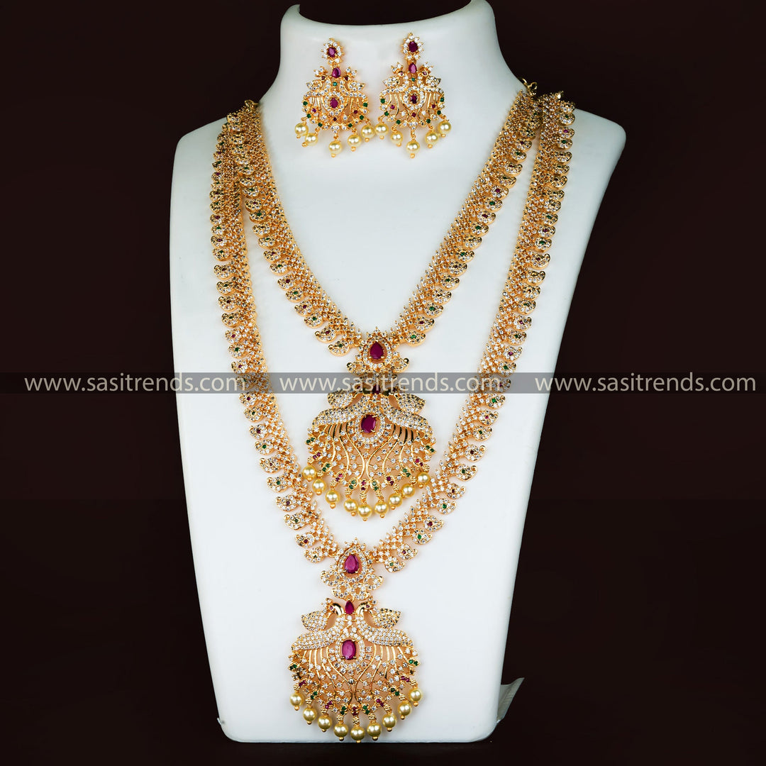 Exquisite semi-bridal combo jewellery set with peacock and mango patterns, adorned with American diamonds and pearls