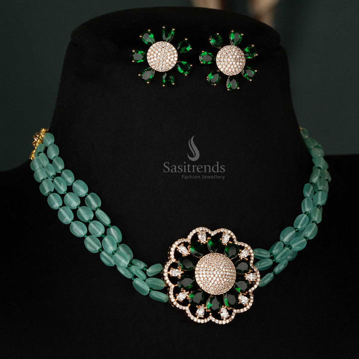 Dazzling green party wear choker with rose gold floral pendant, Monalisa stone lines, and sparkling American diamonds for a luxurious look - Sasitrends