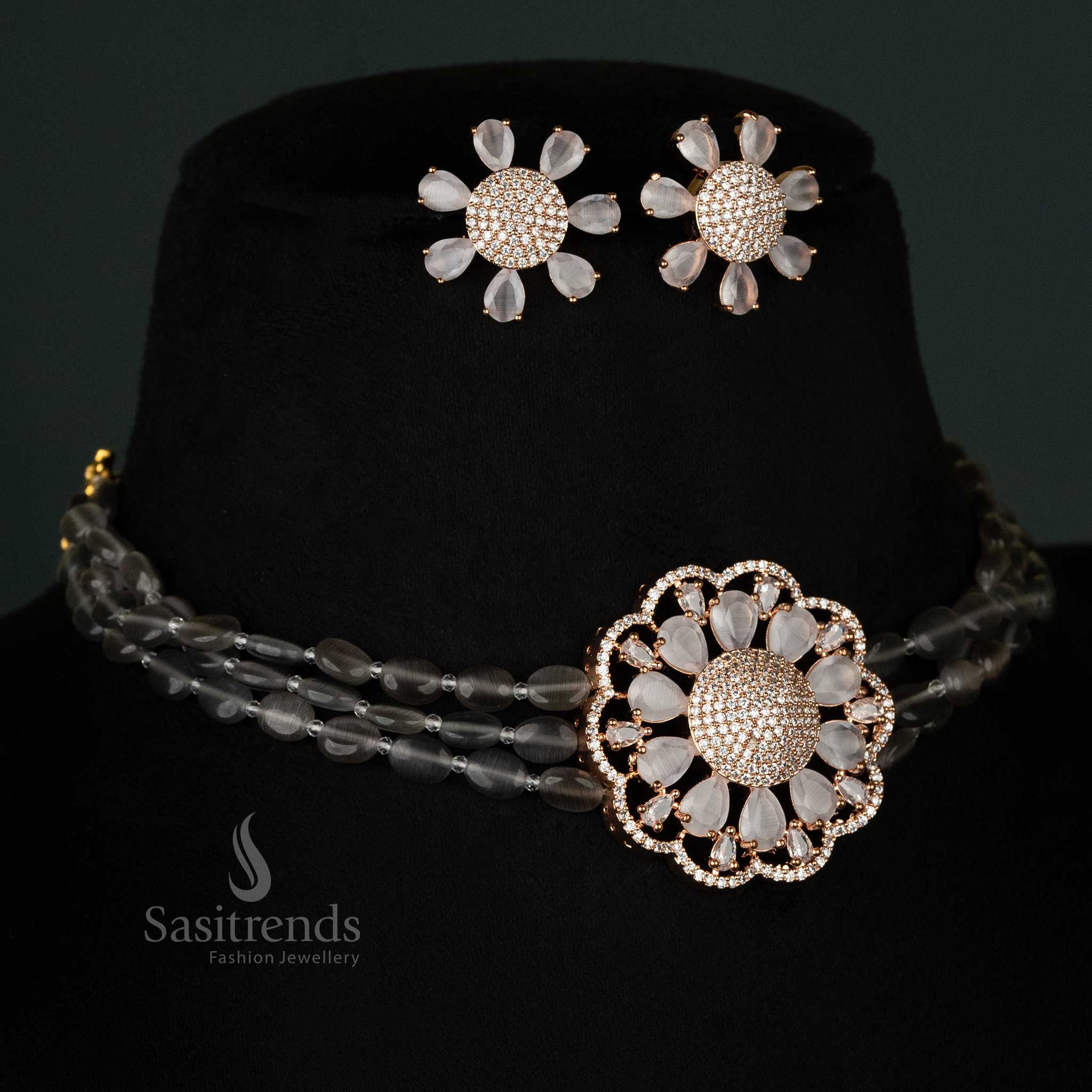 Sophisticated grey choker necklace featuring four Monalisa stone lines, a rose gold floral pendant, and glittering diamond embellishments for formal looks - Sasitrends