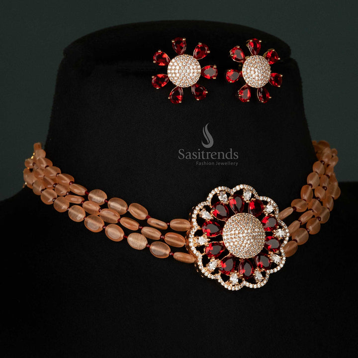 Opulent ruby rose gold-plated choker jewellery set featuring four-lined Monalisa stones and an American diamond-adorned floral pendant - Sasitrends