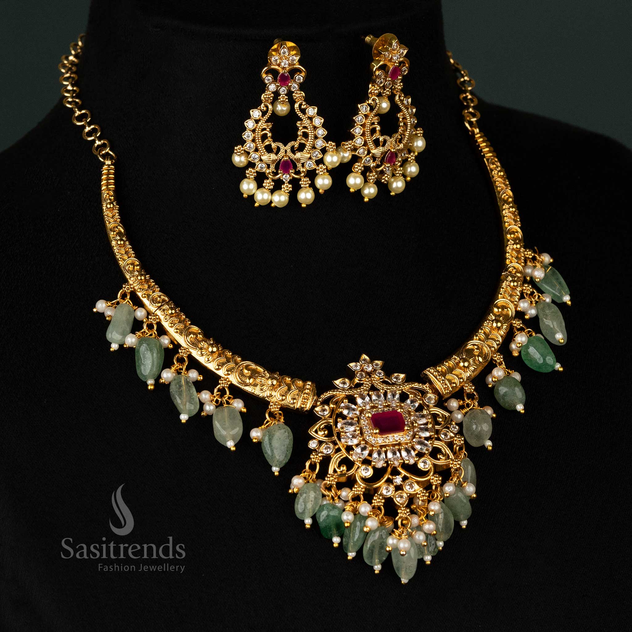 Matte gold plated temple necklace set with intricate filigree pendant and American Diamond stones – Sasitrends