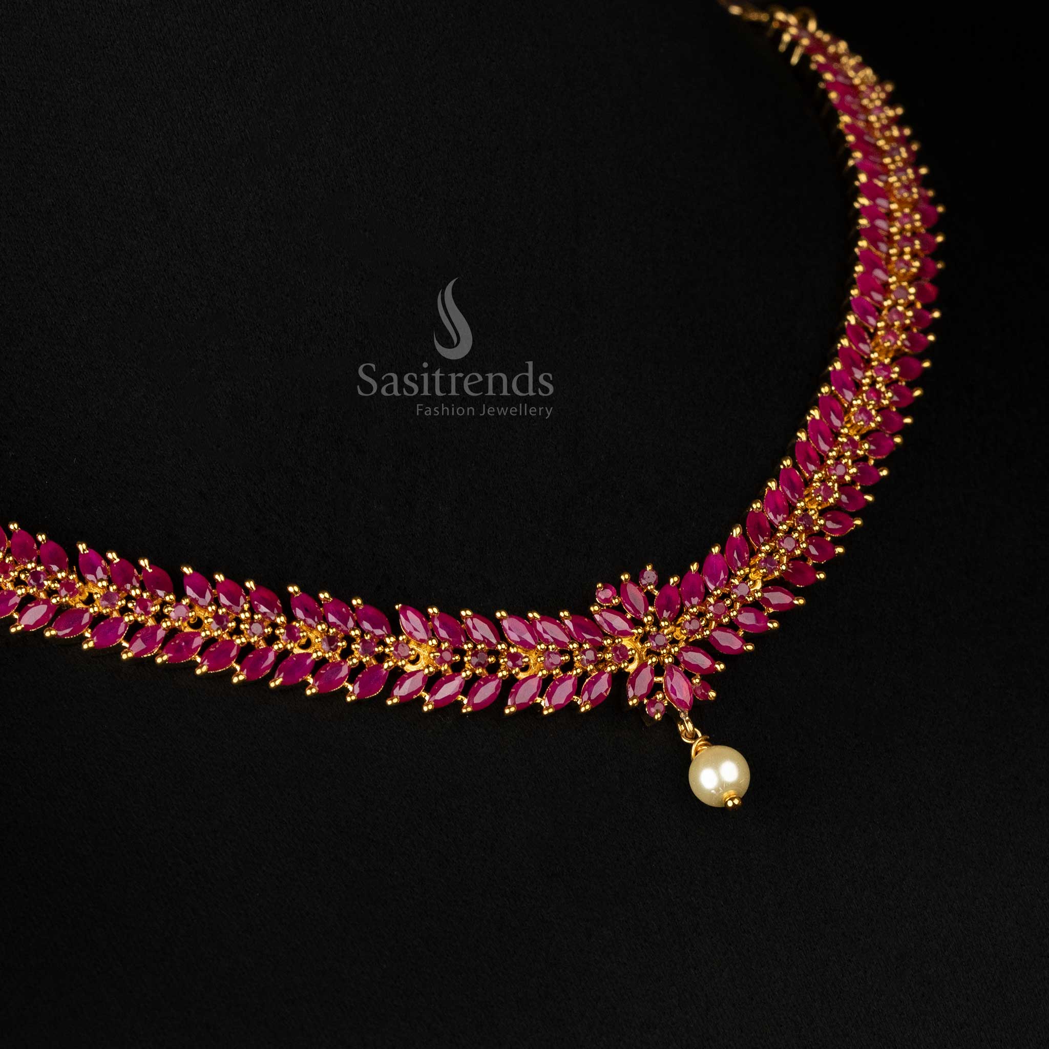 Party wear ruby AD stone jewelry set with floral and leaf design - Sasitrends