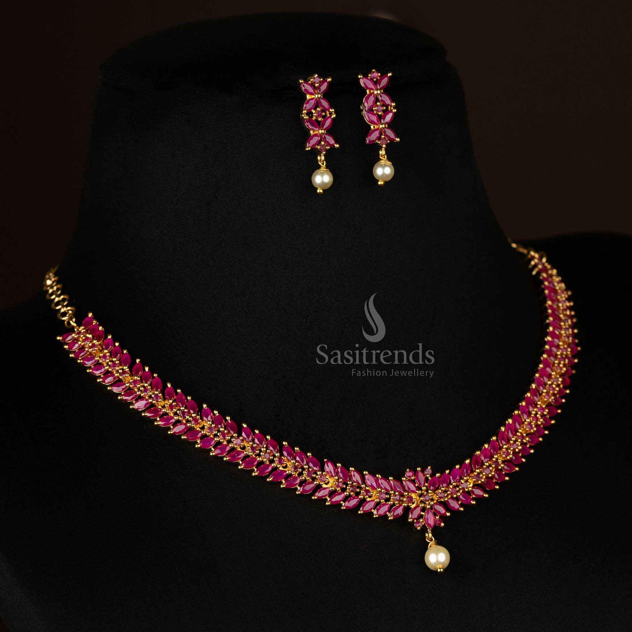 Trendy traditional micro gold-plated floral leaf jewelry set with ruby AD stones - Sasitrends