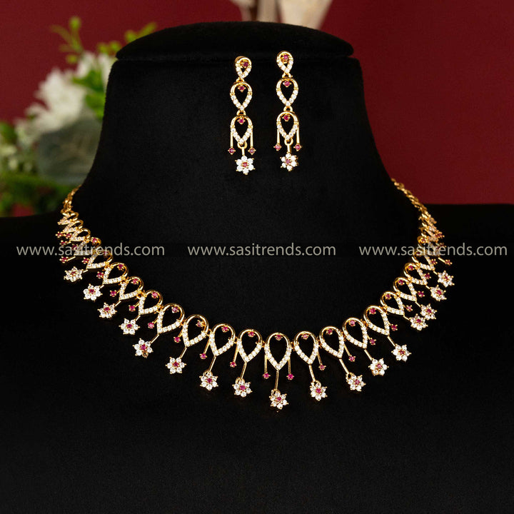 Elegant floral pattern jewellery set with white and ruby stones Sasitrends