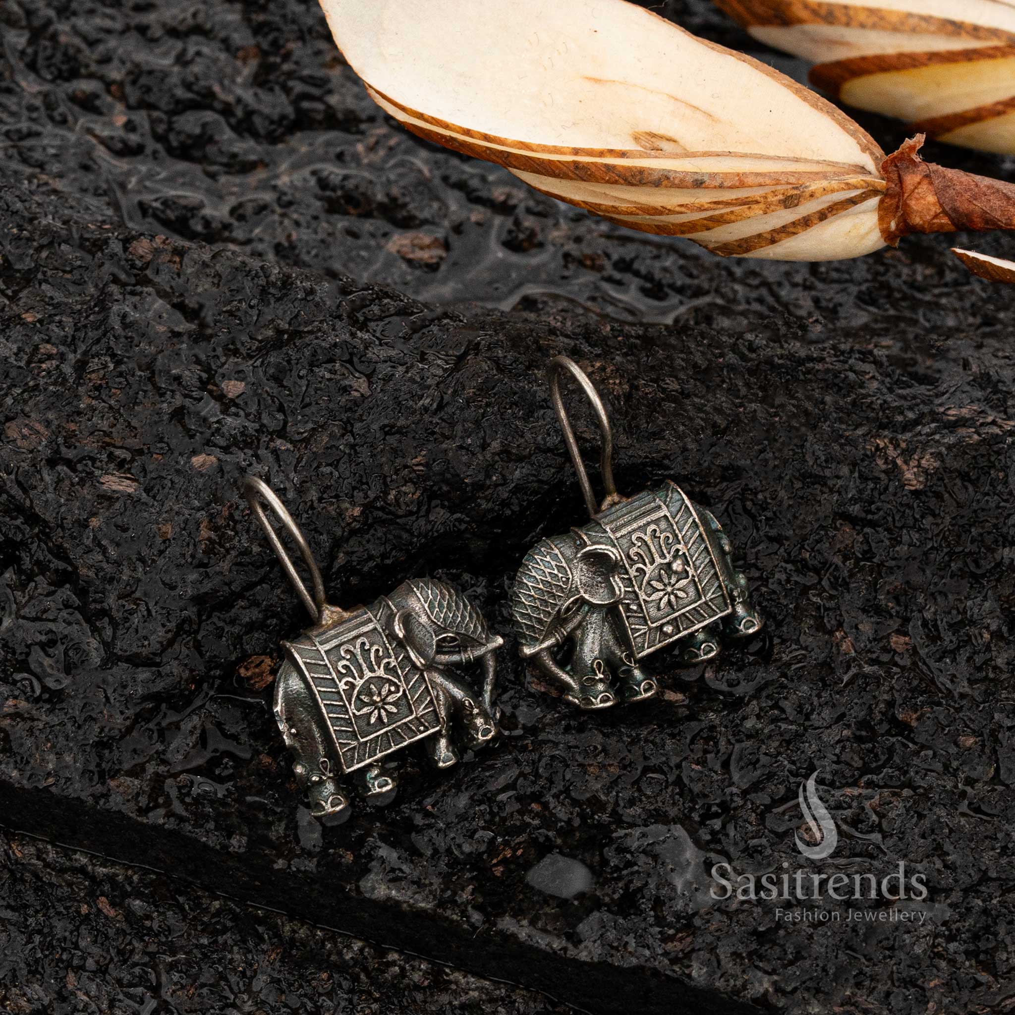 Silver replica oxidised earrings with elephant design - Sasitrends