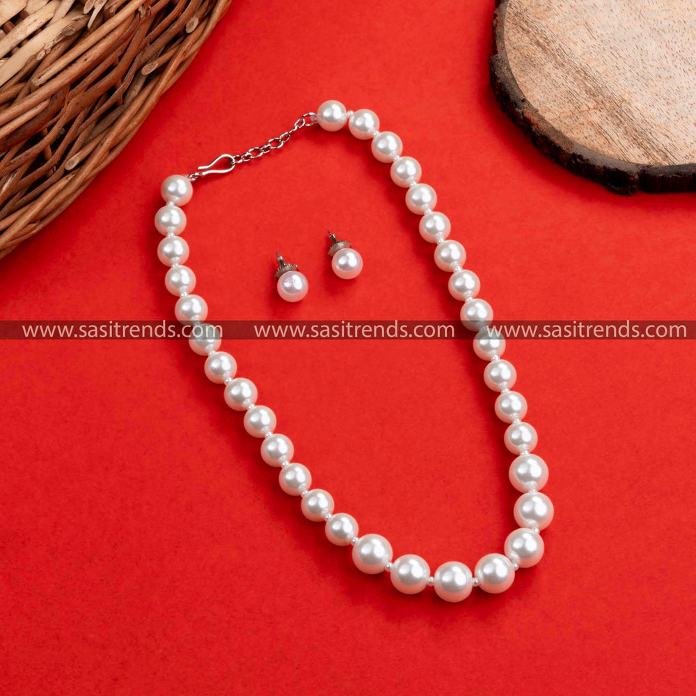 Imitation pearl necklace and earrings set with rhodium silver plating