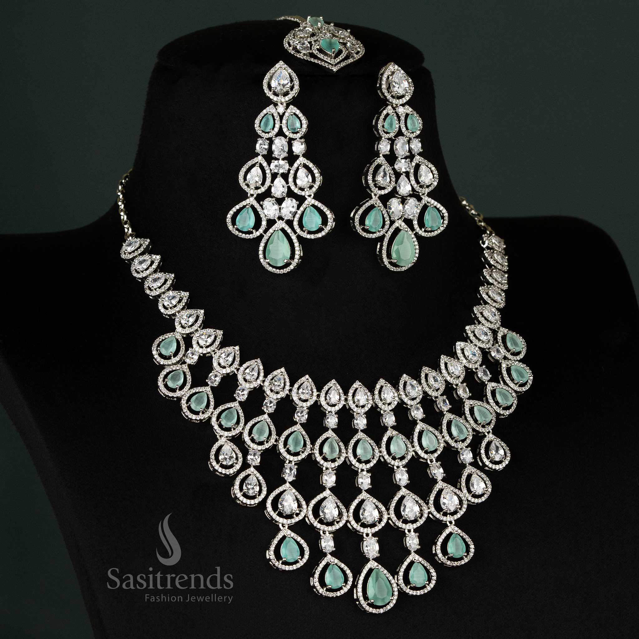 Radiant mint bridal jewellery ensemble in rhodium plating, featuring shimmering American diamonds for timeless bridal beauty - Sasitrends