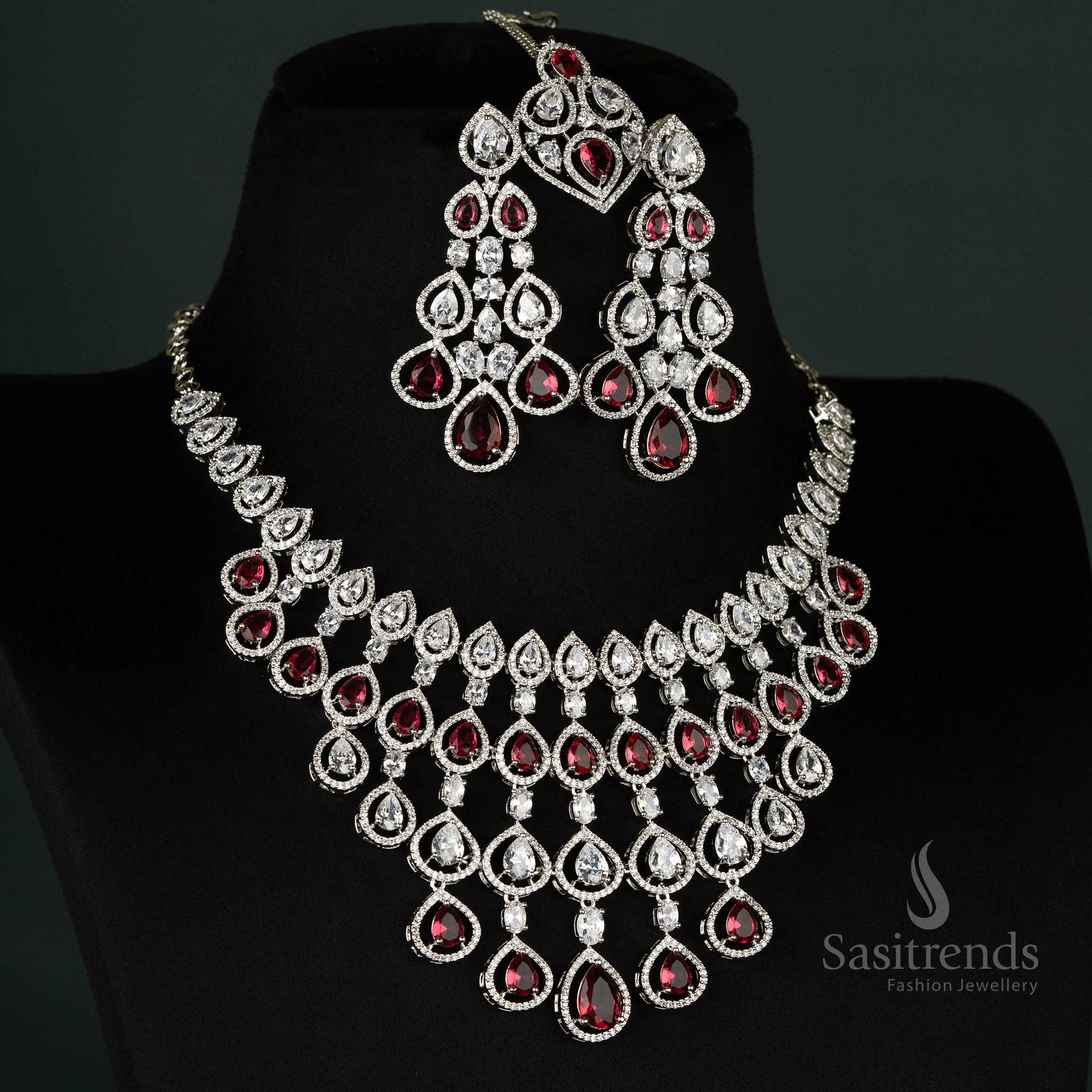 Regal red American diamond rhodium-plated bridal jewellery set featuring intricate craftsmanship and sparkling stones for traditional weddings - Sasitrends