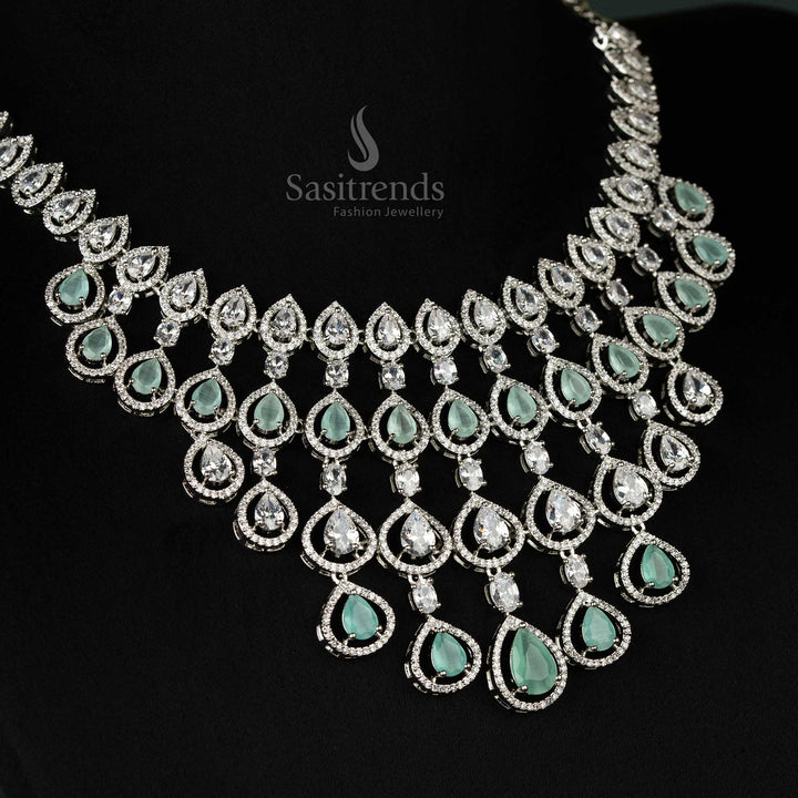 Elegant mint rhodium-plated bridal jewellery set adorned with sparkling American diamonds, designed for luxurious wedding ceremonies - Sasitrends