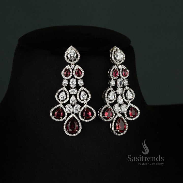 Stunning red bridal jewellery set with rhodium plating and shimmering American diamonds, ideal for the bride's unforgettable special day - Sasitrends