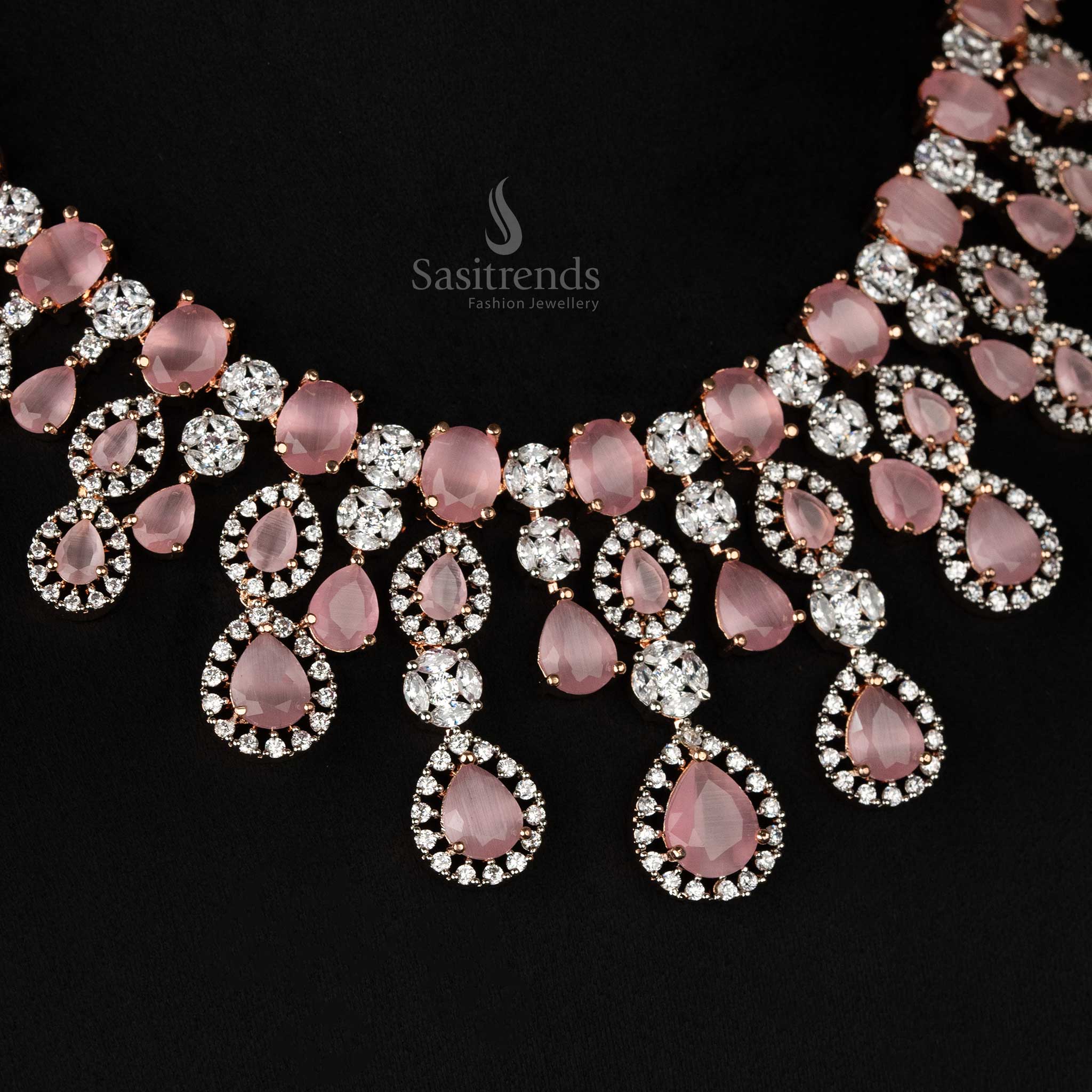 Graceful gold-plated choker necklace set with pink accents, adorned with sparkling American diamonds and earrings, perfect for bridal occasions - Sasitrends