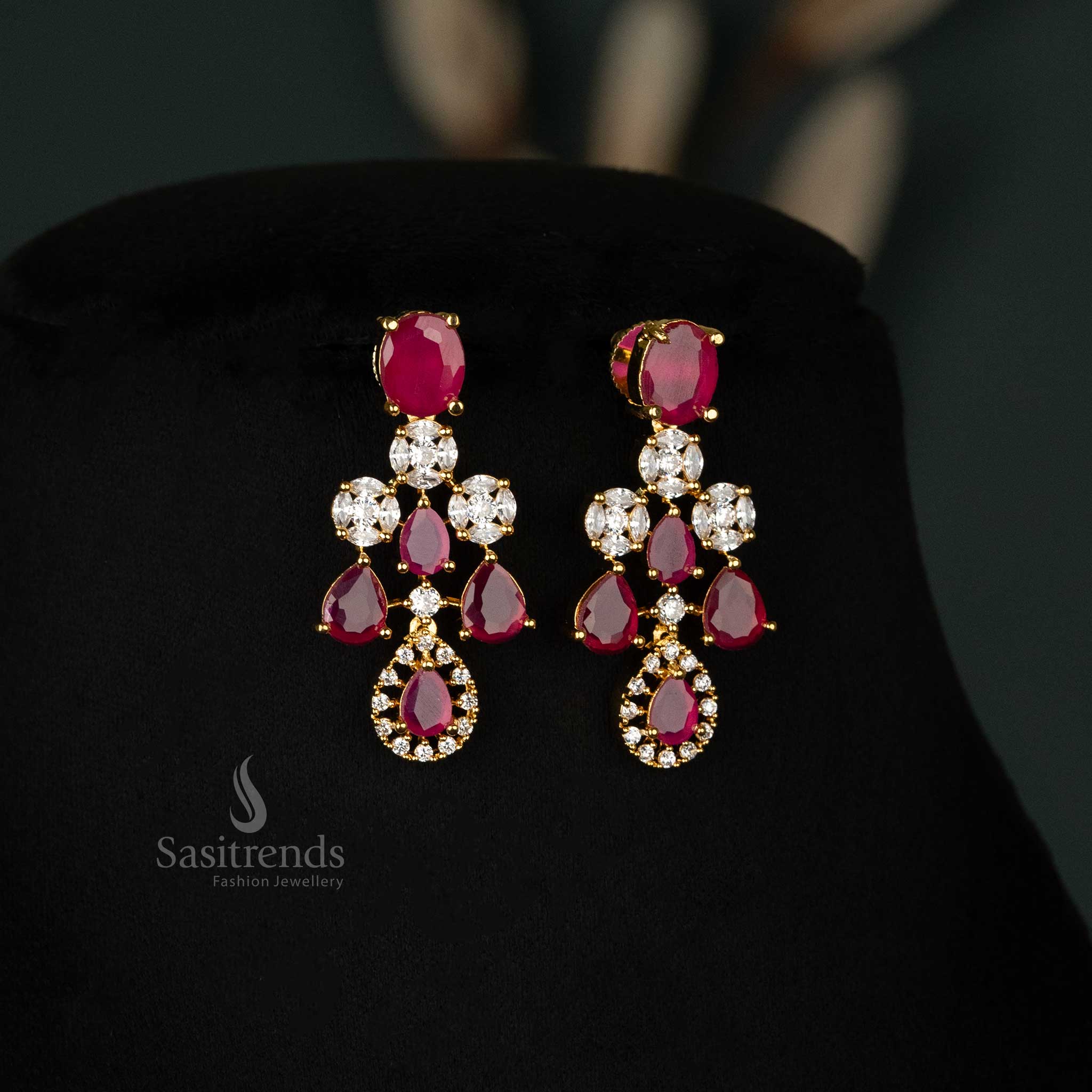 Elegant ruby-colored Gold-plated earrings embellished with dazzling American diamonds and designed for bridal and wedding attire - Sasitrends