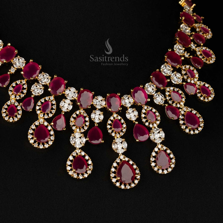 Elegant ruby-colored gold-plated choker necklace set, embellished with dazzling American diamonds and designed for bridal and wedding attire - Sasitrends