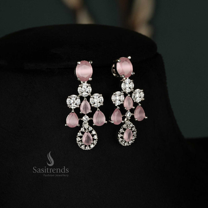 Stylish pink earrings set crafted in rhodium plating with American diamonds and earrings, designed for weddings and bridal occasions - Sasitrends