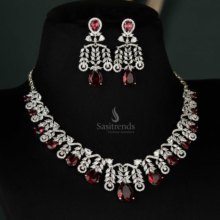 Radiant red teardrop necklace set with leaf cascade design and rhodium silver finish, complete with coordinated earrings - Sasitrends