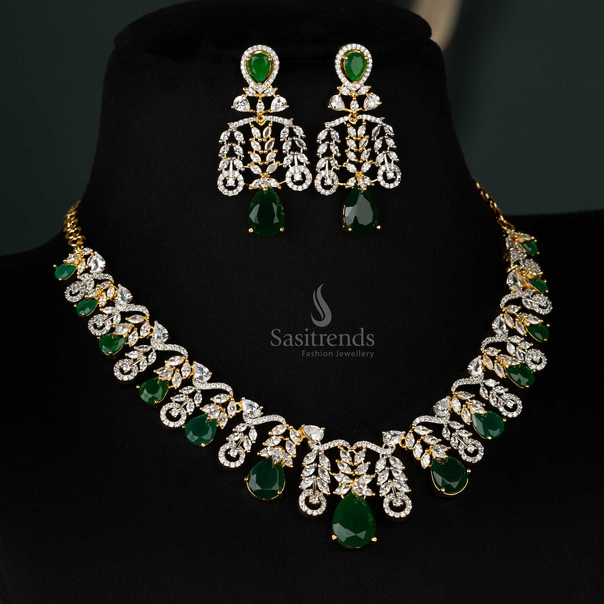 Sophisticated green cascading leaf motif necklace set in gold-plated finish, complete with teardrop diamonds and matching earrings for a timeless look - Sasitrends