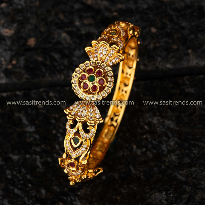 Sasitrends -  Temple Matte Gold-Plated Sarang Kada with Luxurious Floral AD Stone Design Bangle