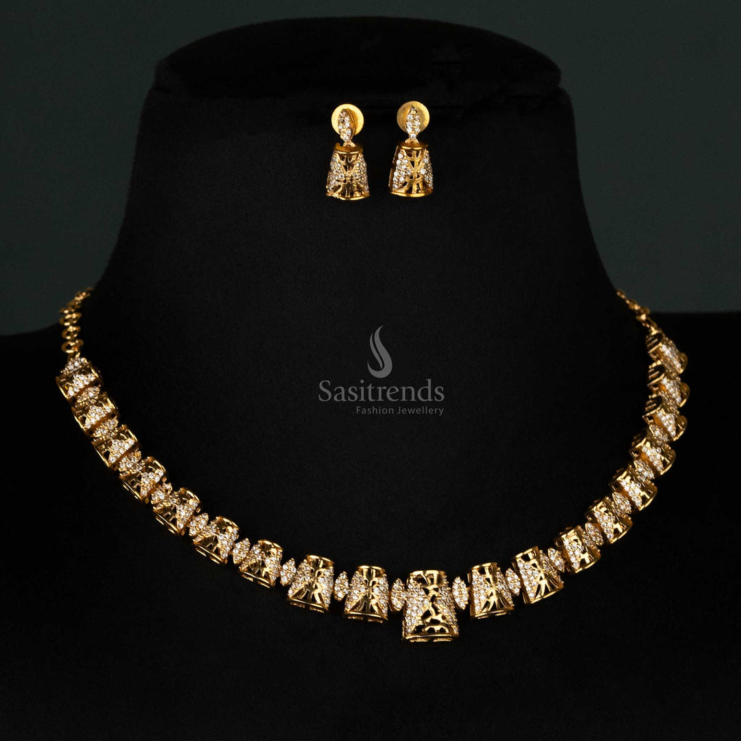 Matte gold-plated jewellery set with American diamond-studded cone designs - Sasitrends