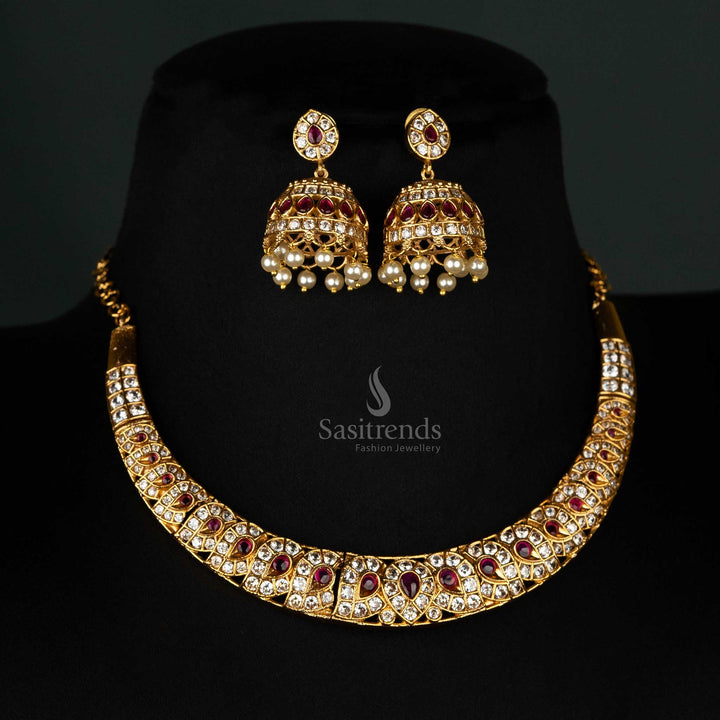 Premium Matte Gold-Plated American Diamond Necklace Jewellery Set with Teardrop Motifs, Ruby Accents, and Dome-Shaped Matching Jhumka Earrings with Hanging Pearls - Sasitrends