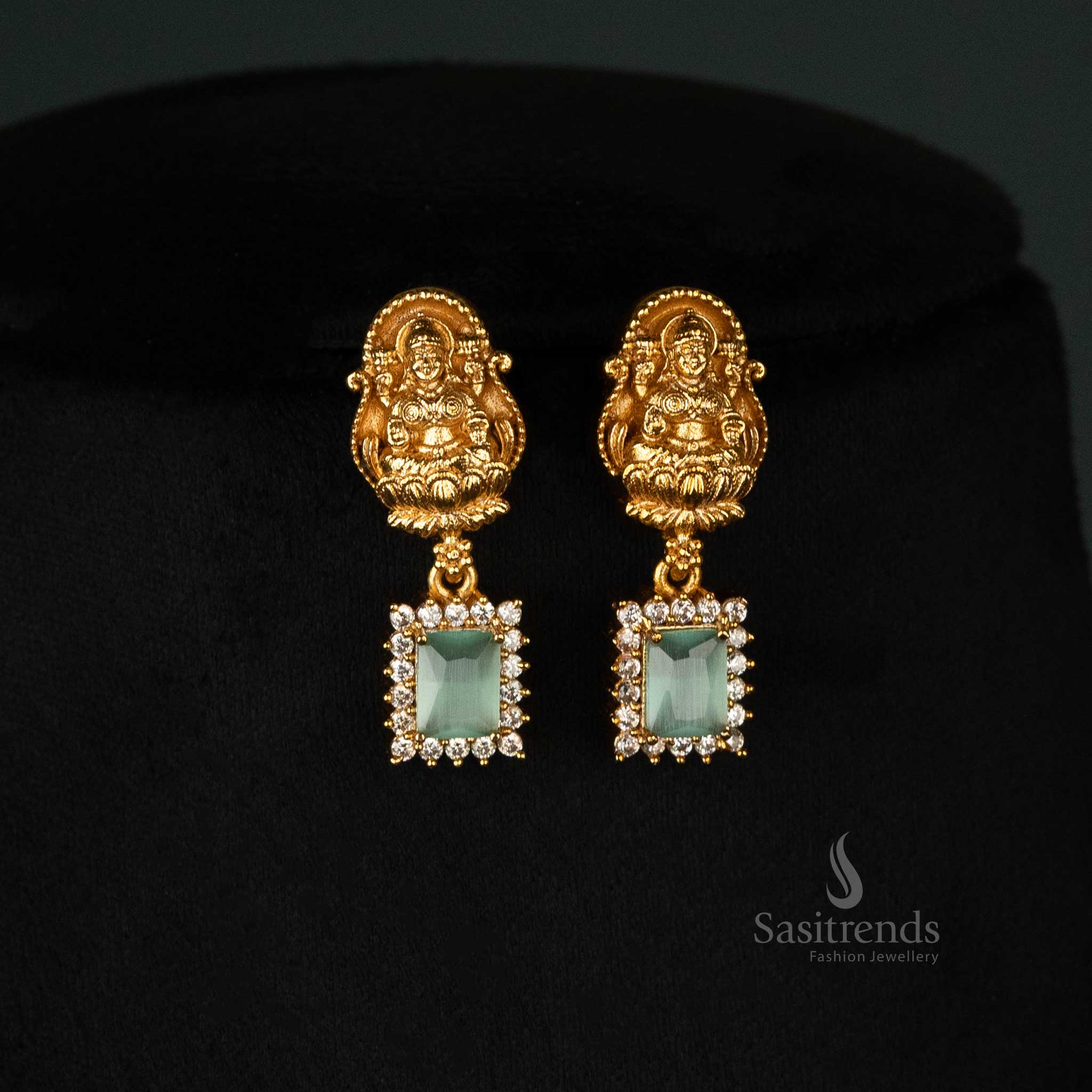 Temple-style matte gold-plated necklace with matching Lakshmi motif earrings - Sasitrends