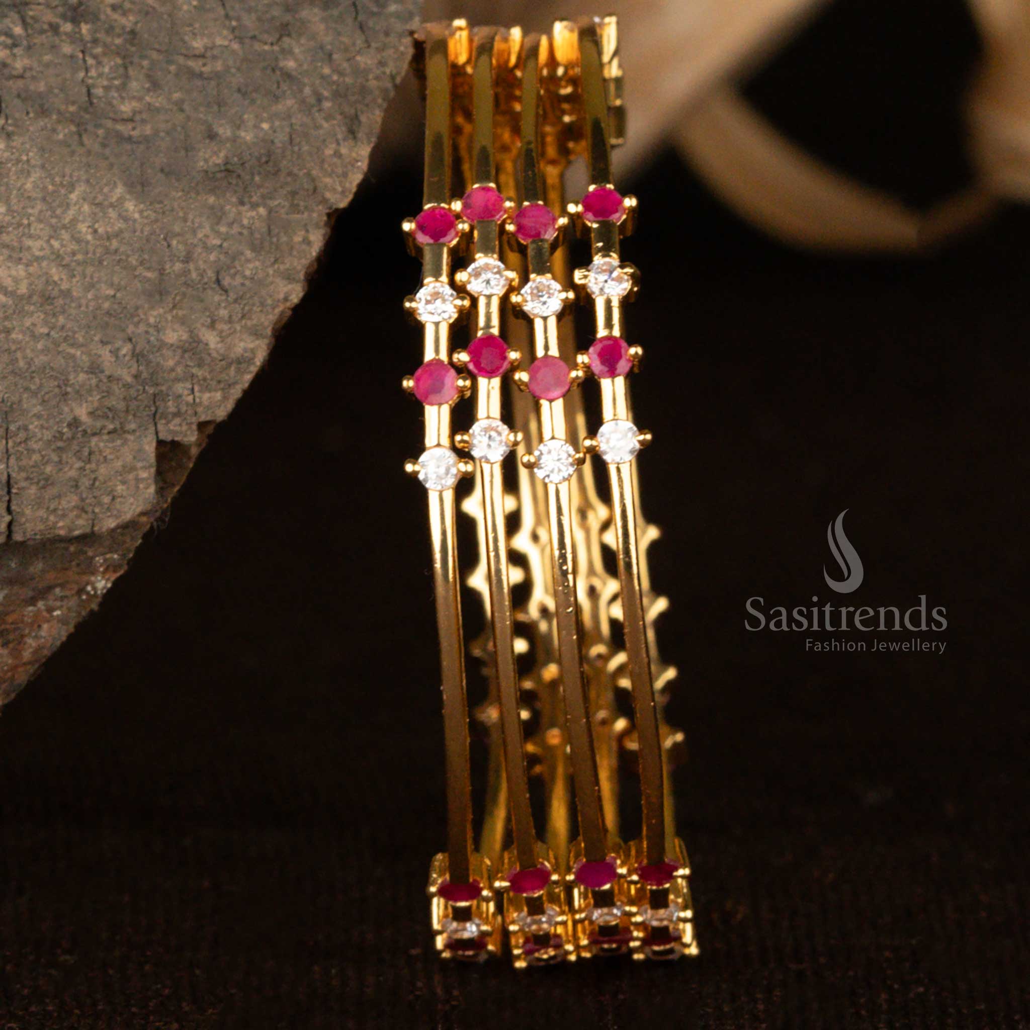 Elegant ruby-white thin micro gold plated bangles set with American diamond stones for a classy jewellery piece ideal for celebrations - Sasitrends