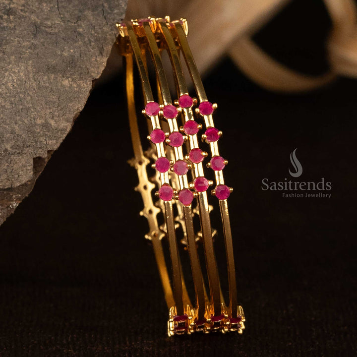 Luxurious ruby-colored micro gold plated thin bangles set with American diamond embellishments for a trendy look and timeless jewellery style - Sasitrends