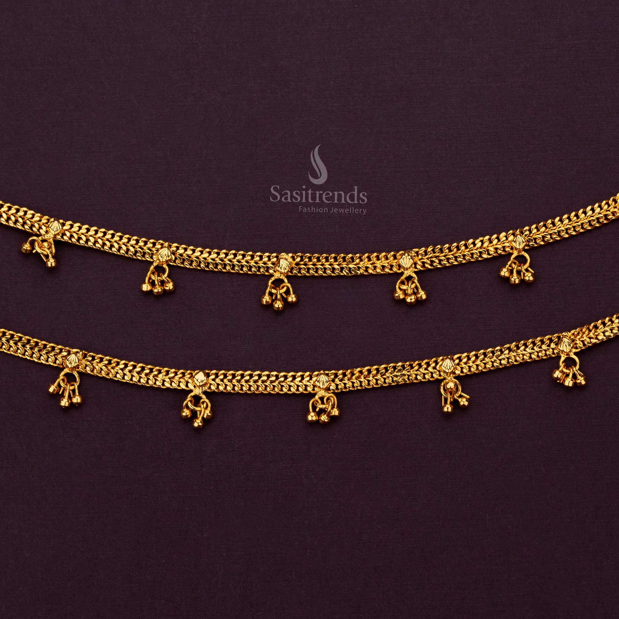 Close-up of luxury gold accented anklets, perfect for festive wear - Sasitrends