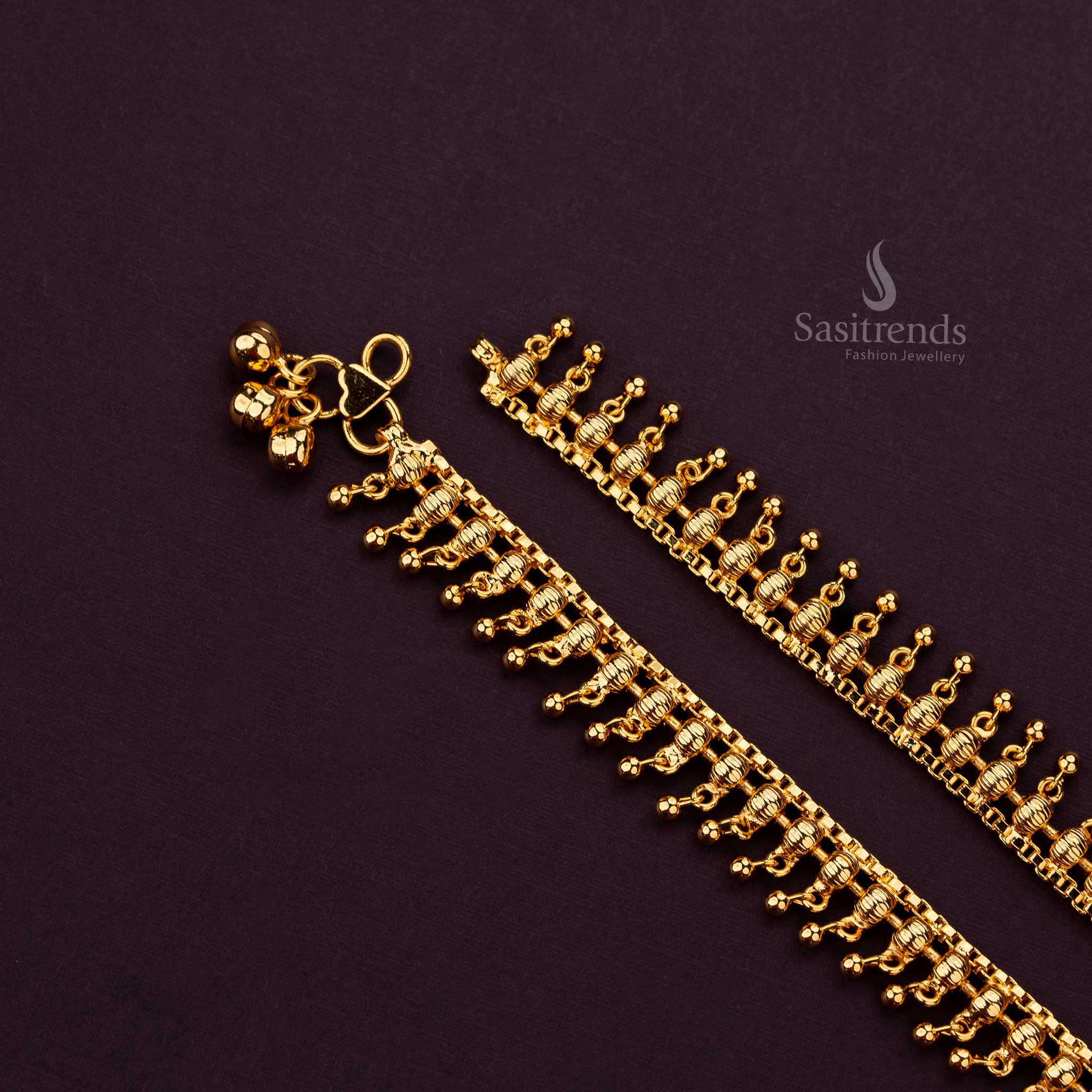 Elegant gold anklets with decorative beads, perfect for festive occasions - Sasitrends