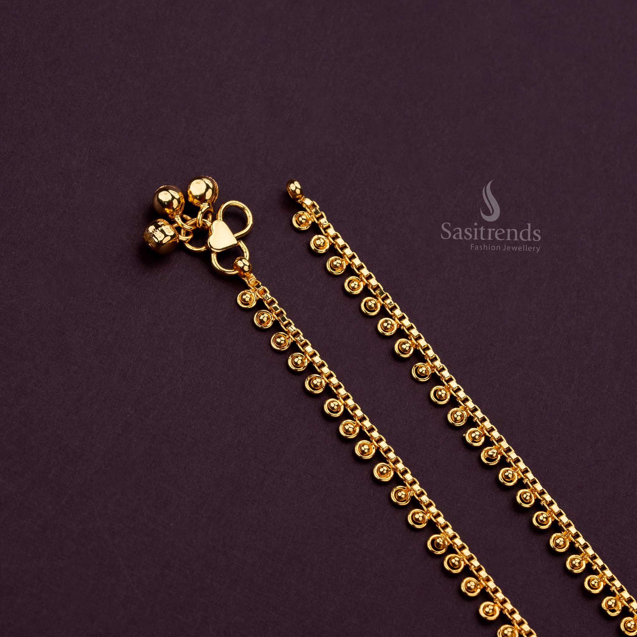 Close-up of the delicate design of a micro gold plated anklet - Sasitrends