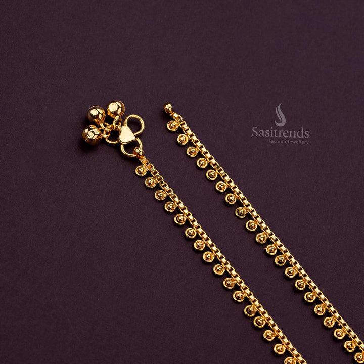 Close-up of the delicate design of a micro gold plated anklet - Sasitrends