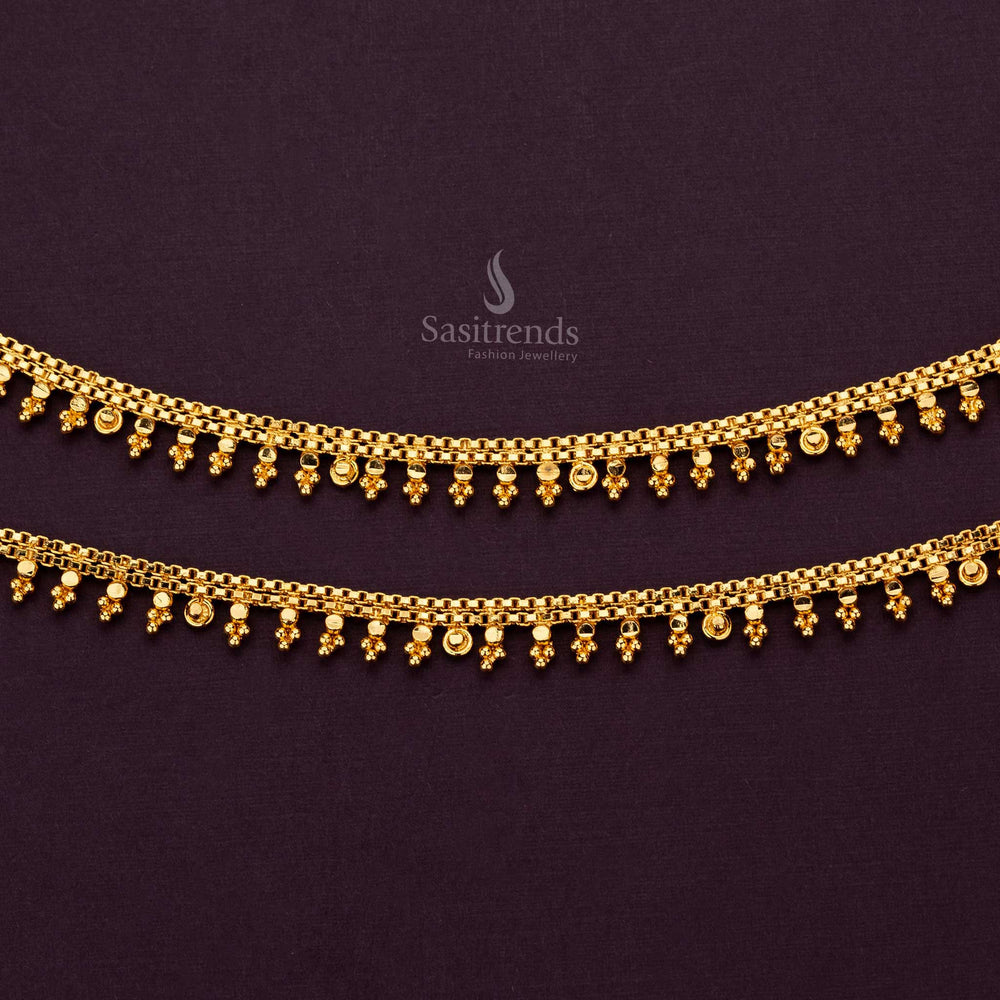 Elegant gold anklets featuring intricate bead design and heart clasp - Sasitrends