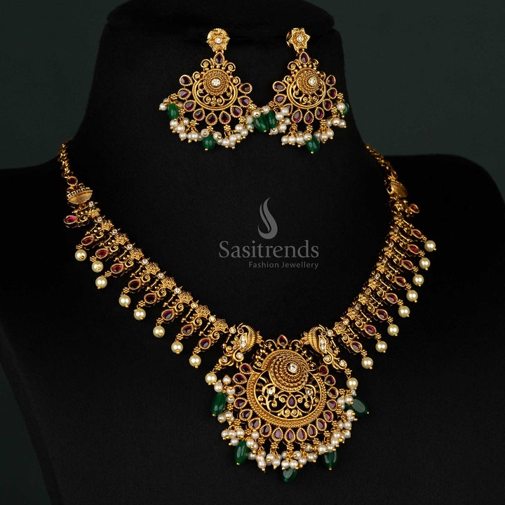 Classic matte gold jewellery set adorned with ruby stones, pearls, and exquisite filigree work for a royal vibe - Sasitrends