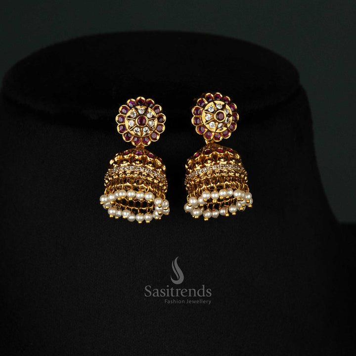 Sophisticated temple-style  ruby detailing, pearls jhumkas - Sasitrends