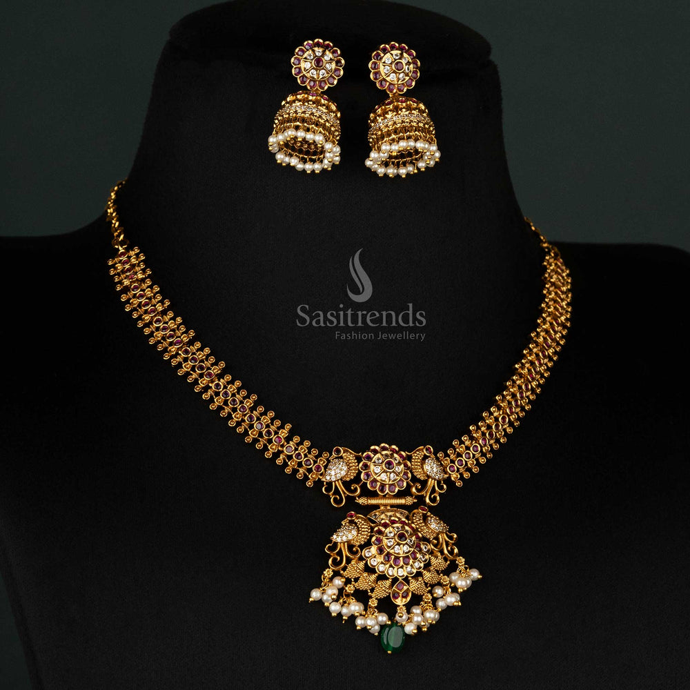 Luxurious matte gold temple necklace with ruby accents, pearls, and elegant jhumkas - Sasitrends