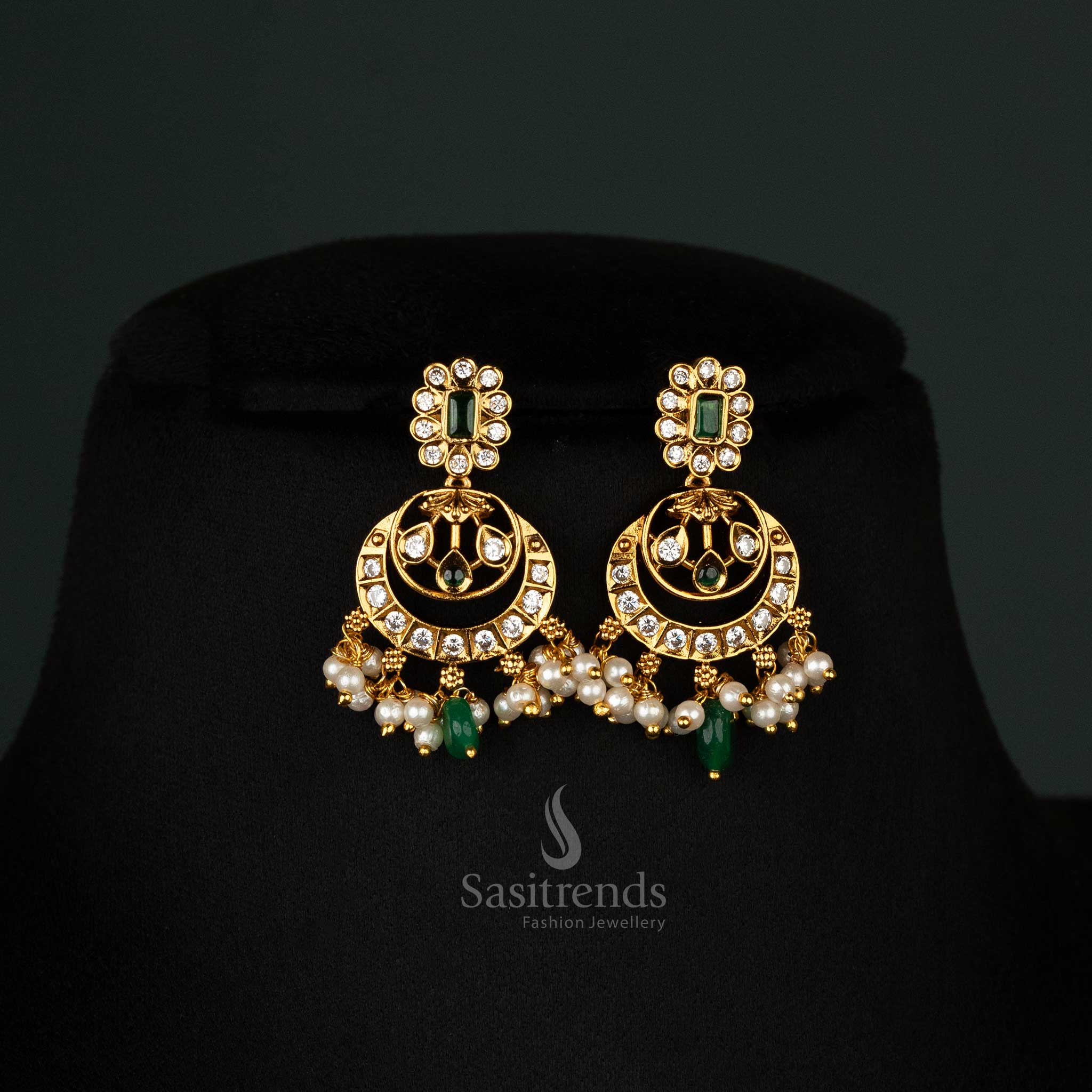 Elegant temple matte gold-plated  green American diamond stones, floral motifs, pearls, matching jhumkas - Sasitrends