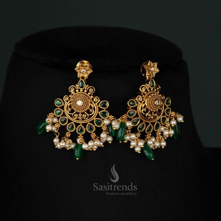 Elegant traditional Earrings set with green beads, matte gold finish, and intricate filigree details for a refined look - Sasitrends