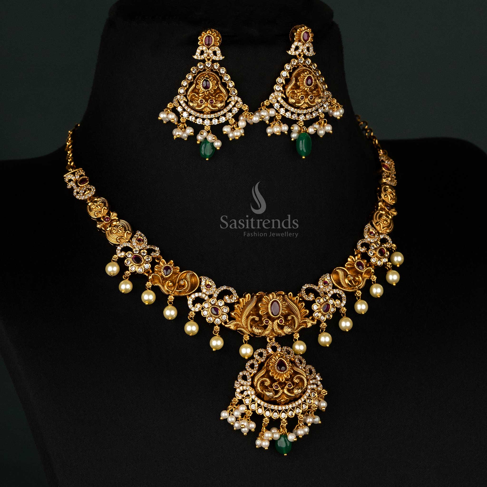 Classic temple necklace adorned with ruby stones, matte gold plating, and intricate peacock and pearl craftsmanship - Sasitrends