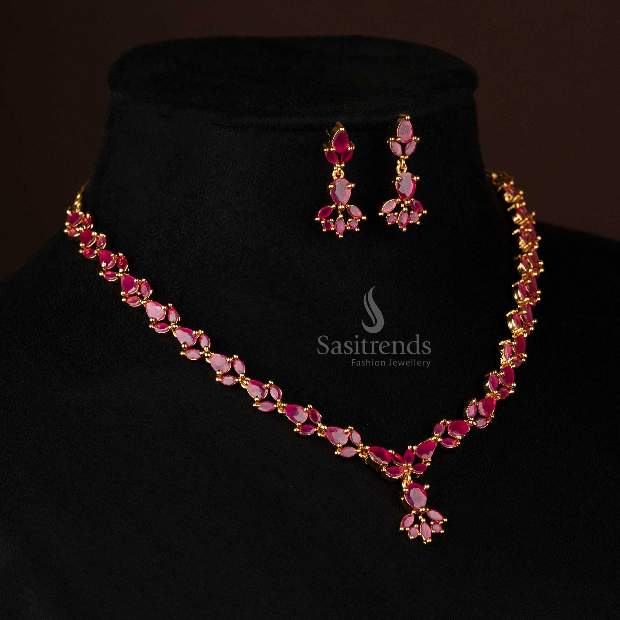 Stunning American diamond necklace set with ruby accents and waterdrop motif design - Sasitrends