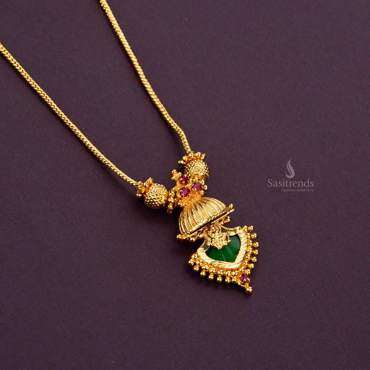 Elegant green Palakka pendant featuring pink stones and intricate golden balls