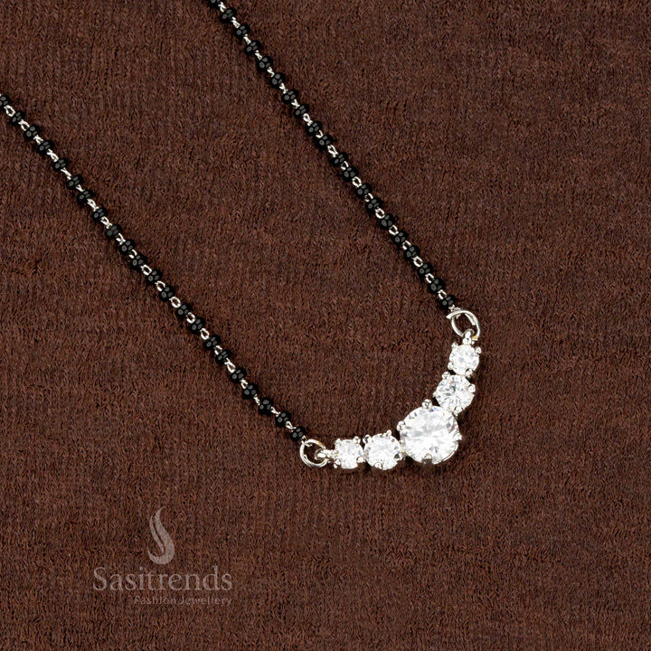 Elegant festive mangalsutra featuring a crescent-shaped AD pendant - Sasitrends