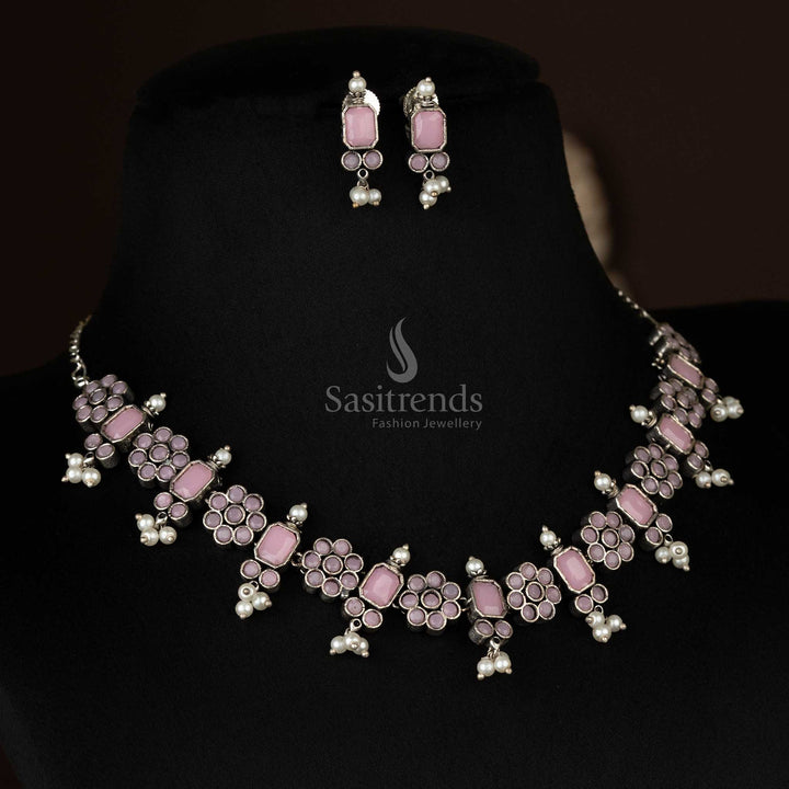 Delicate oxidized floral necklace set with pearl drops in rosy pink, radiating feminine charm for elegant and chic ensembles - Sasitrends