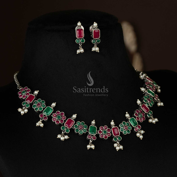 Majestic oxidized floral necklace set with pearl drops in ruby and green, a stunning dual-tone accessory designed for weddings and celebrations - Sasitrends