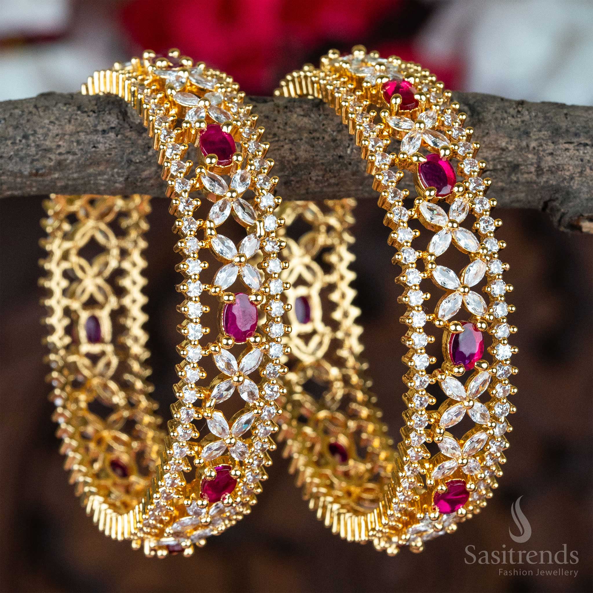 Grand white-ruby toned traditional floral bangles pair with micro gold plating, featuring sparkling diamond highlights - Sasitrends