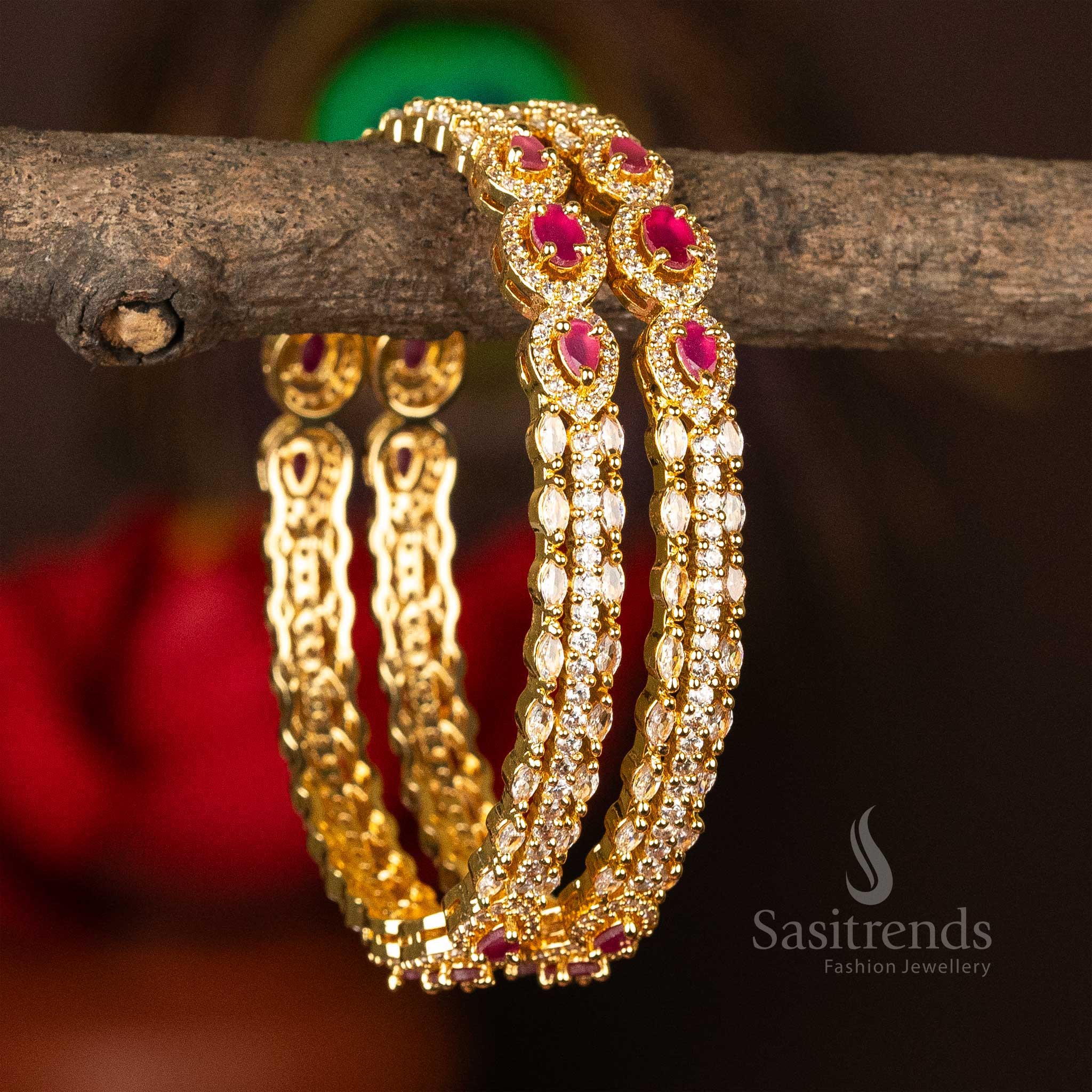 Regal white-ruby toned gold plated bangles with exquisite American diamond accents, radiating timeless traditional charm and sophistication - Sasitrends