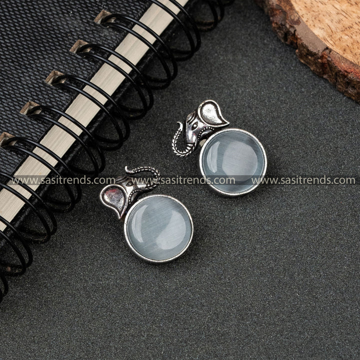 Traditional OXidised German Silver Elephant Head And Round Monalisa Stone White Earrings