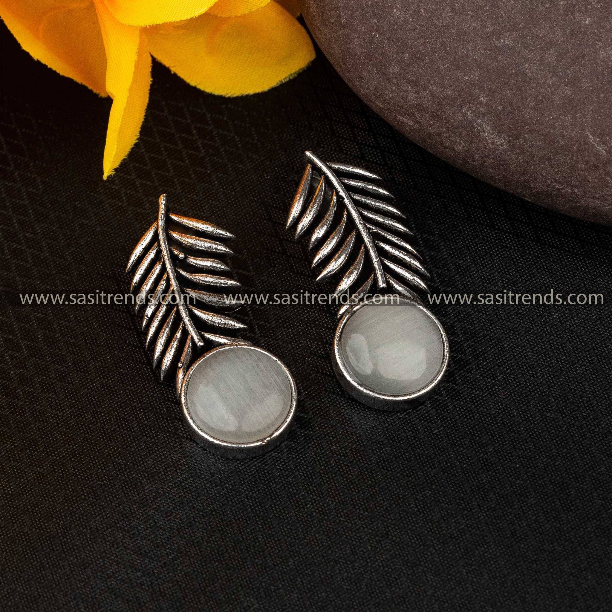 Chic grey Monalisa stone earrings with leaf pattern in oxidised German silver