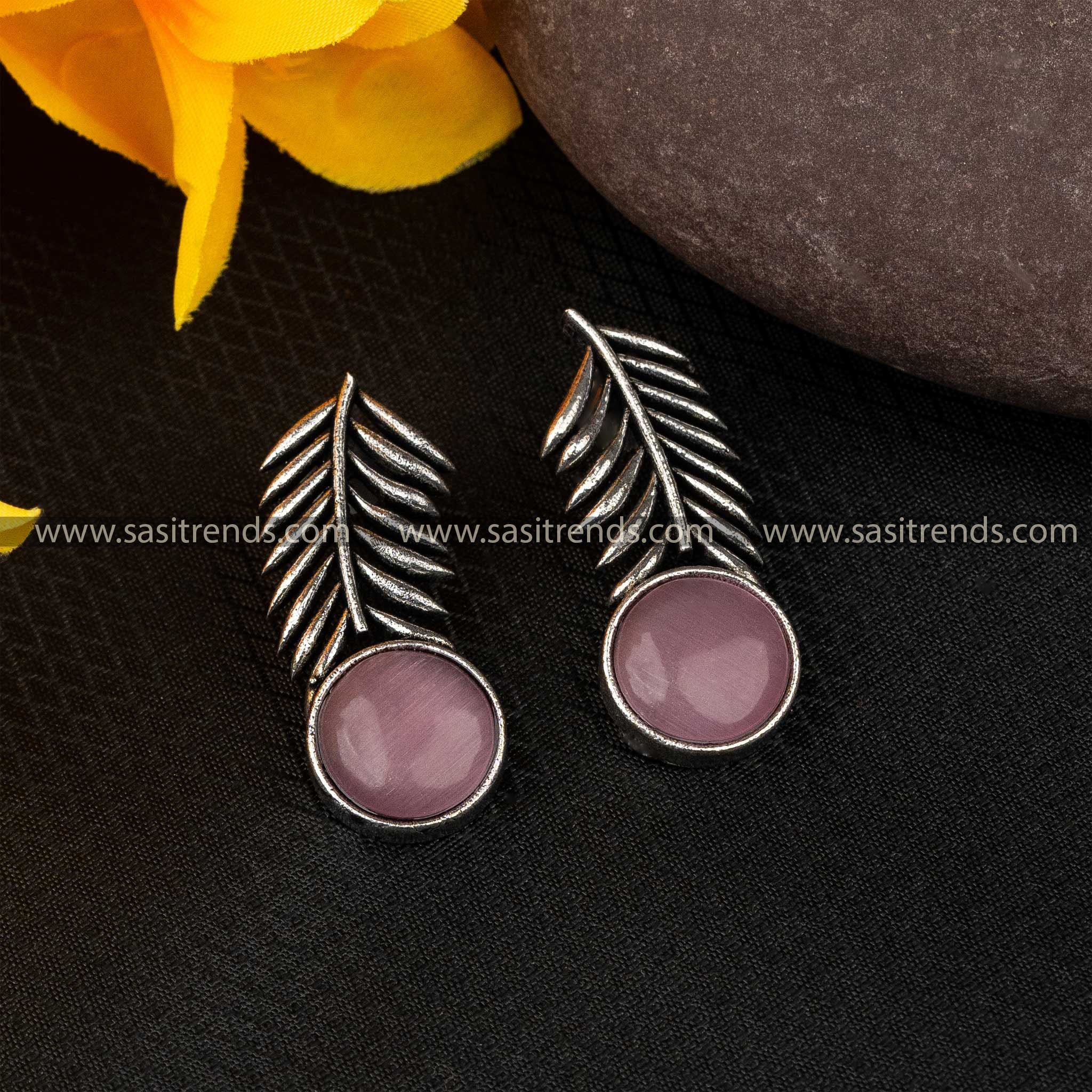 Oxidized German silver earrings with mauve Monalisa stone and elegant leaf design