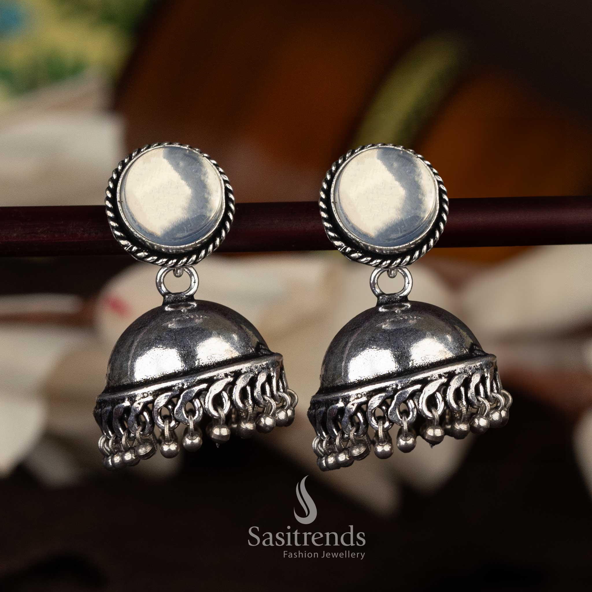 White stone oxidised silver jhumka earrings with classic dome shape and tassels - Sasitrends